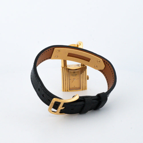 Montre Hermès - Montre Kelly en acier doré et cadran champagne 58 Facettes