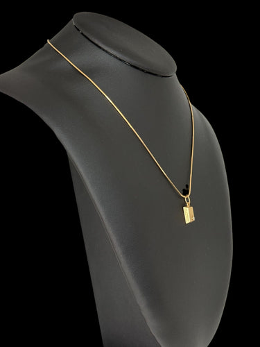 CARTIER - Lingot pendentif 1/8 oz or jaune avec diamant