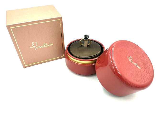 Bague 54 POMELLATO. Collection "Nudo Petit", bague 2 ors 18K et topaze bleue de Londres 58 Facettes