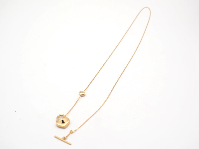 Collier Chaîne et pendentif cadena et coeur en or jaune 58 Facettes