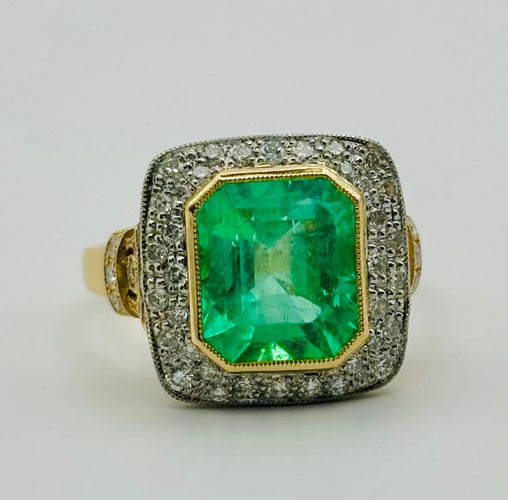 Bague 53 Bague en or jaune et platine avec une émeraude et des diamants 58 Facettes 50323