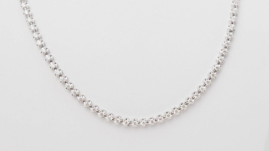 Collier 44.5 Collier rivière en or blanc et diamants 58 Facettes 32532