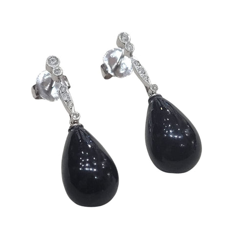 Boucles d'oreilles Boucles d'oreilles en corail noir et diamants, en or blanc 18 carats 58 Facettes PE326