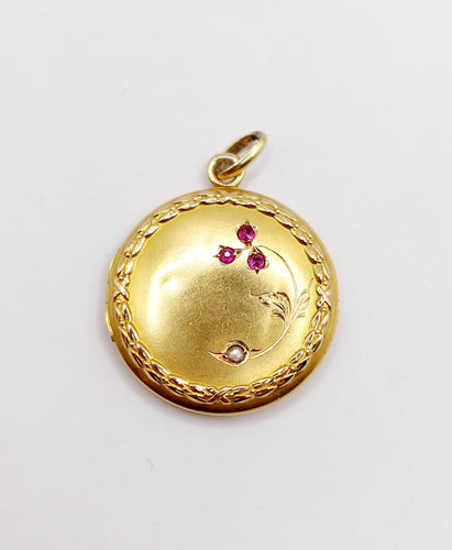 Pendentif Pendentif porte-photo antique fleur en or 18k avec diamant et rubis vers 1910 58 Facettes A06431