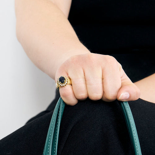 Bague 46 Bague marguerite, or jaune, saphir et diamants 58 Facettes CO2