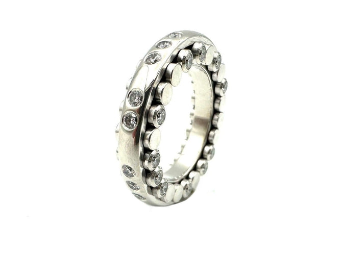 Bague 55 BUCHERER. Bague "Dizzler" or blanc 18K et diamants 58 Facettes