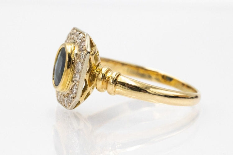 Bague 59 Bague géométrique en or ornée de saphirs et de diamants. 58 Facettes 11260