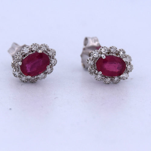 Boucles d'oreilles en or blanc avec rubis et diamants