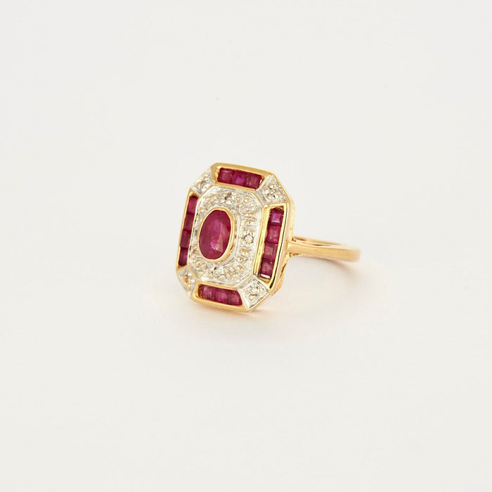 Bague Bague Octogonale en or jaune, rubis, diamants 58 Facettes 1