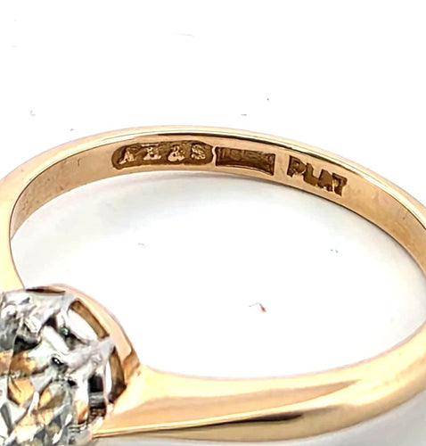 Solitaire en platine et or jaune 18 carats serti d'un diamant ancien de 1,50 carat