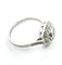 Bague 58 Bague en platine avec diamant central et diamants environnants 58 Facettes
