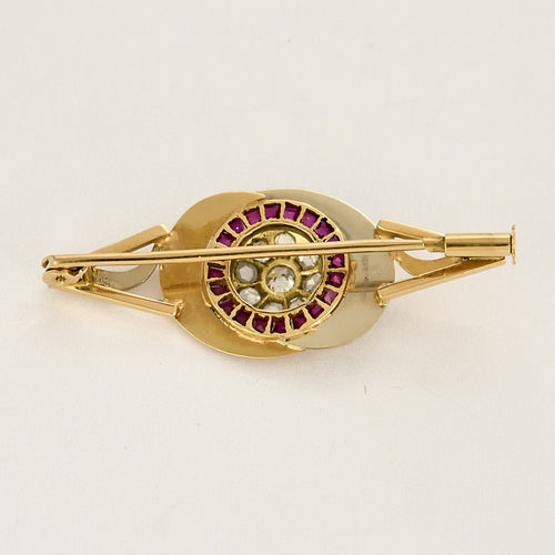 Broche Broche en or jaune, or gris, rubis et diamants 58 Facettes BLO015831