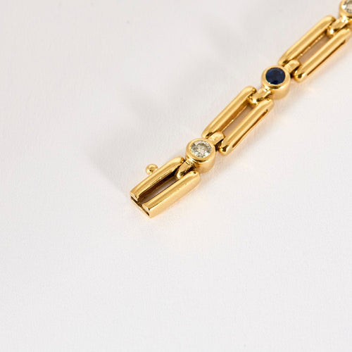 Bracelet Bracelet en or jaune, diamants et saphirs 58 Facettes LP1236/17