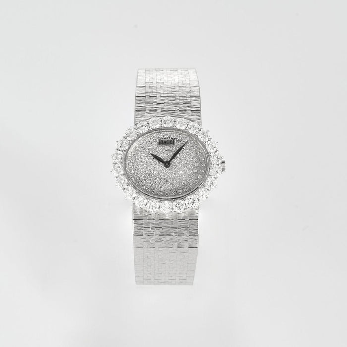 Montre PIAGET - Montre de dame, or blanc et diamants 58 Facettes 240716