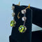 Boucles d'oreilles Paire de boucles d’oreilles en or jaune 18 carats et platine, diamants et peridots 58 Facettes AB500