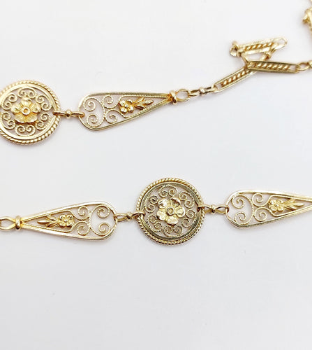 Collier Collier Art Nouveau or jaune motifs filigranés et fleuris (circa 1910) 58 Facettes A05217
