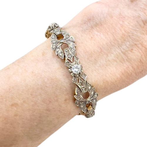 Bracelet Bracelet design Art Déco en or jaune et platine avec diamants 58 Facettes Q315B