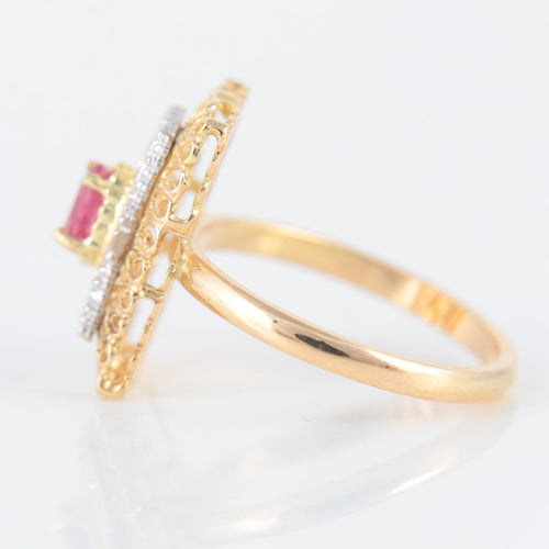 Bague 50 Bague or jaune, rubis, motifs "arabesques" 58 Facettes