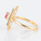 Bague 50 Bague or jaune, rubis, motifs "arabesques" 58 Facettes