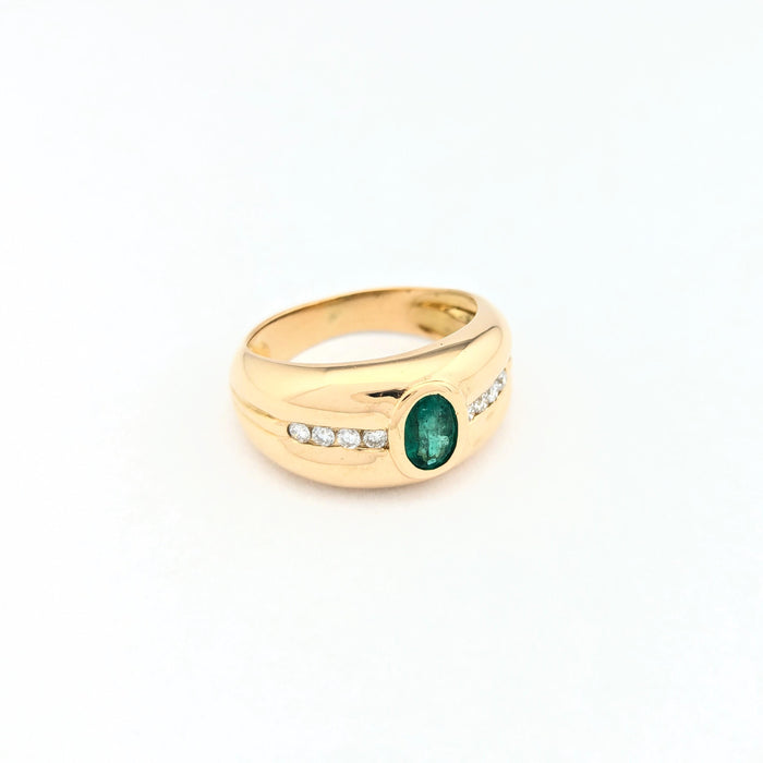 Bague en or jaune émeraude et diamants