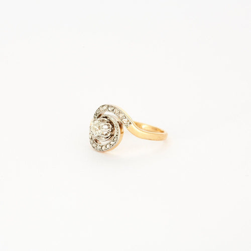 Bague Bague tourbillon en or jaune et platine sertie de diamants 58 Facettes