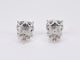 Boucles d'oreilles Boucles d'oreilles en or blanc avec un diamant taille brillant 58 Facettes 2108