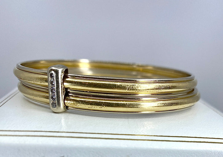 Bracelet Bracelet double joncs, or blanc, diamants, Yves Saint Laurent 58 Facettes AB601