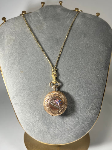 Montre Montre de col émaillé et sa chaîne en or jaune 58 Facettes 226