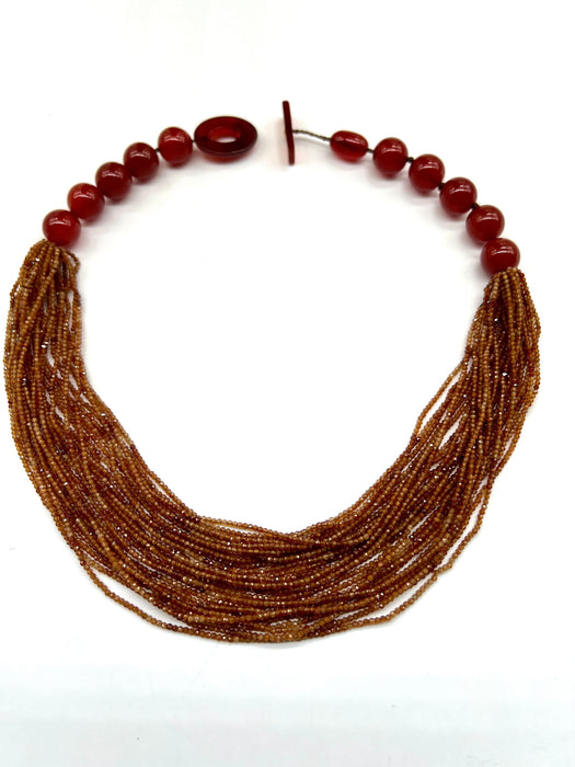 Collier Collier agathe hessonite rouge et bakélite 58 Facettes