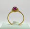 Bague Bague en or jaune avec un saphir rose ovale et des diamants 58 Facettes 50291