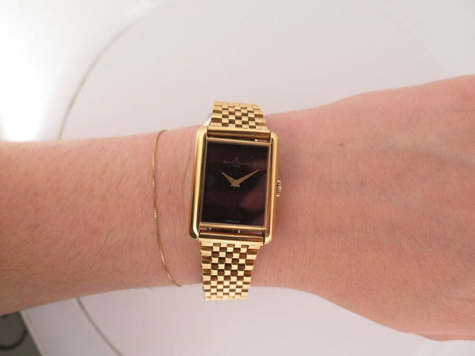 Montre vintage montre baume & mercier tank 37077 mecanique or 18k & oeil de tigre 58 Facettes 268283