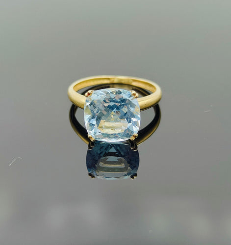Bague 50 Bague en or avec topaze bleu clair 58 Facettes