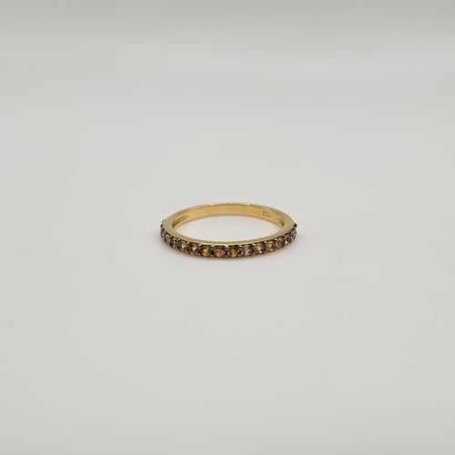 Bague 54 Demi-alliance or jaune 18 carats sertie de saphirs oranges 58 Facettes