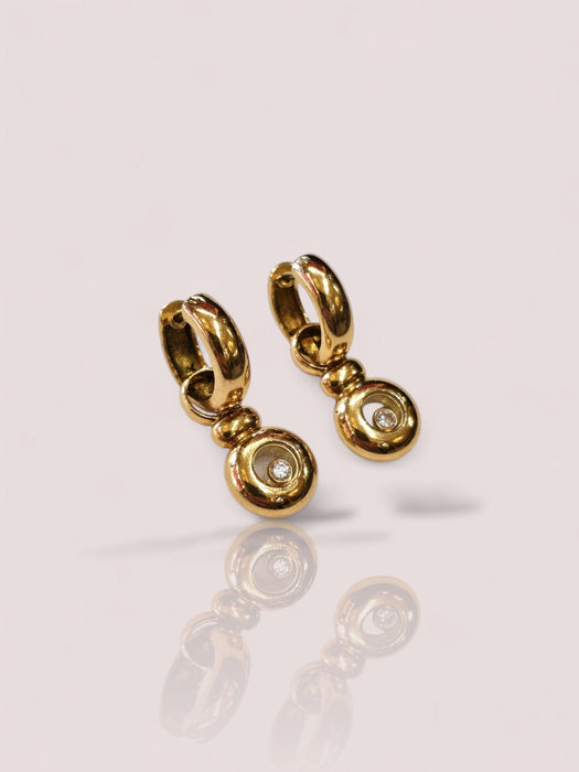 Boucles d'oreilles Chopard Happy Diamonds en or jaune 18 carats avec diamants