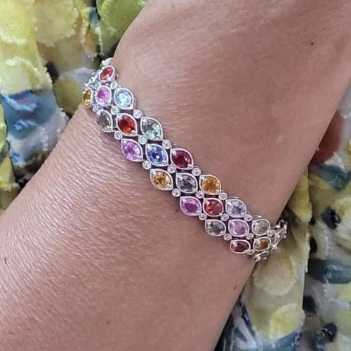 Bracelet Bracelet en or blanc 18 carats serti de saphirs multicolores et de diamants brillants 58 Facettes P175