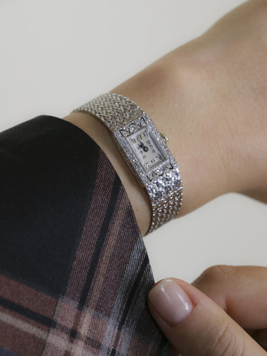 Montre Montre Art Déco or blanc diamants 58 Facettes 1181.7