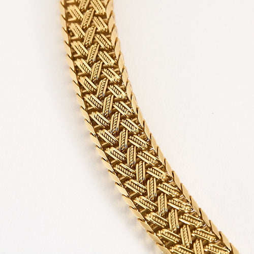 Collier Collier négligé en or jaune tressé 58 Facettes MON0828