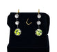 Boucles d'oreilles Paire de boucles d’oreilles en or jaune 18 carats et platine, diamants et peridots 58 Facettes AB500