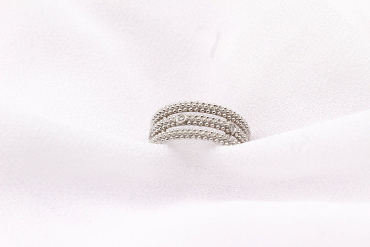 Bague Mauboussin - Bague Le Premier Jour 3 anneaux perlés en or blanc et diamants 58 Facettes 250354