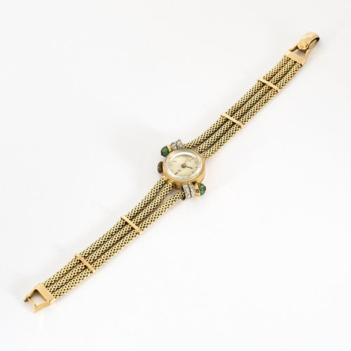 Montre Montre ancienne UTI en or jaune 58 Facettes