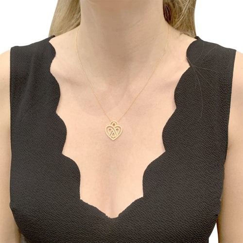Collier Collier Poiray, "Coeur entrelacé", or rose et diamants. 58 Facettes 35035