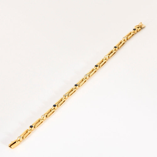 Bracelet Bracelet en or jaune, diamants et saphirs 58 Facettes LP1236/17