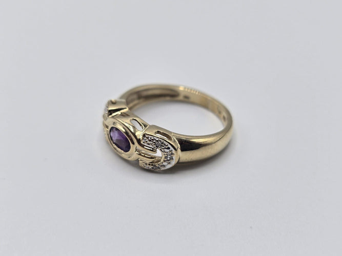 Bague 54 Bague OR Jaune 14k sertie d'une tourmaline au centre et d'éclats de diamants sur les côtés 58 Facettes 1-0000437/5