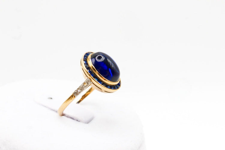 Bague Bague or jaune, platine, saphir cabochon 58 Facettes 250101