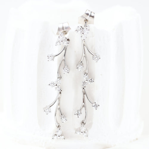 Boucles d'oreilles Boucles d'oreilles en or blanc avec diamants taille brillant 58 Facettes 133721D