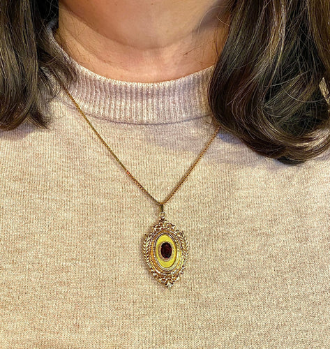 Pendentif Pendentif porte souvenir ouvrant en or et grenat 58 Facettes AB574