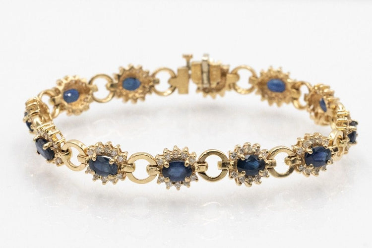 Bracelet Bracelet exclusif en or jaune 14k avec saphirs et diamants 58 Facettes 11393