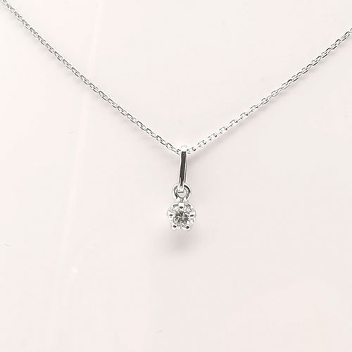 Collier Collier en or blanc serti d'un diamant de 0.15 carat 58 Facettes