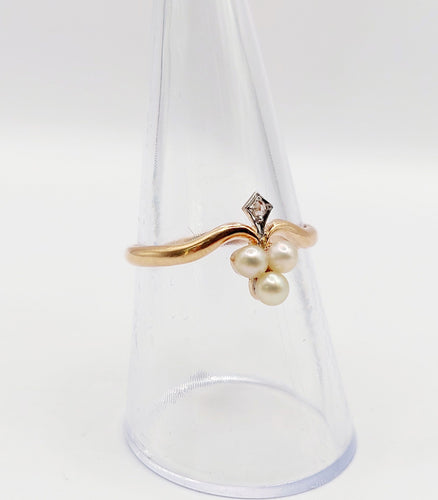 Bague trèfle antique en or rose, perles et diamant
