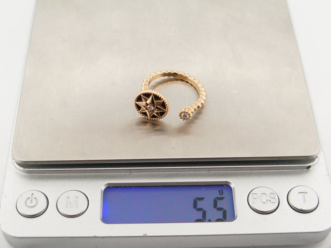Bague 55 bague DIOR rose des vents t55 or jaune 18k diamants 0.10ct onyx 58 Facettes 271385